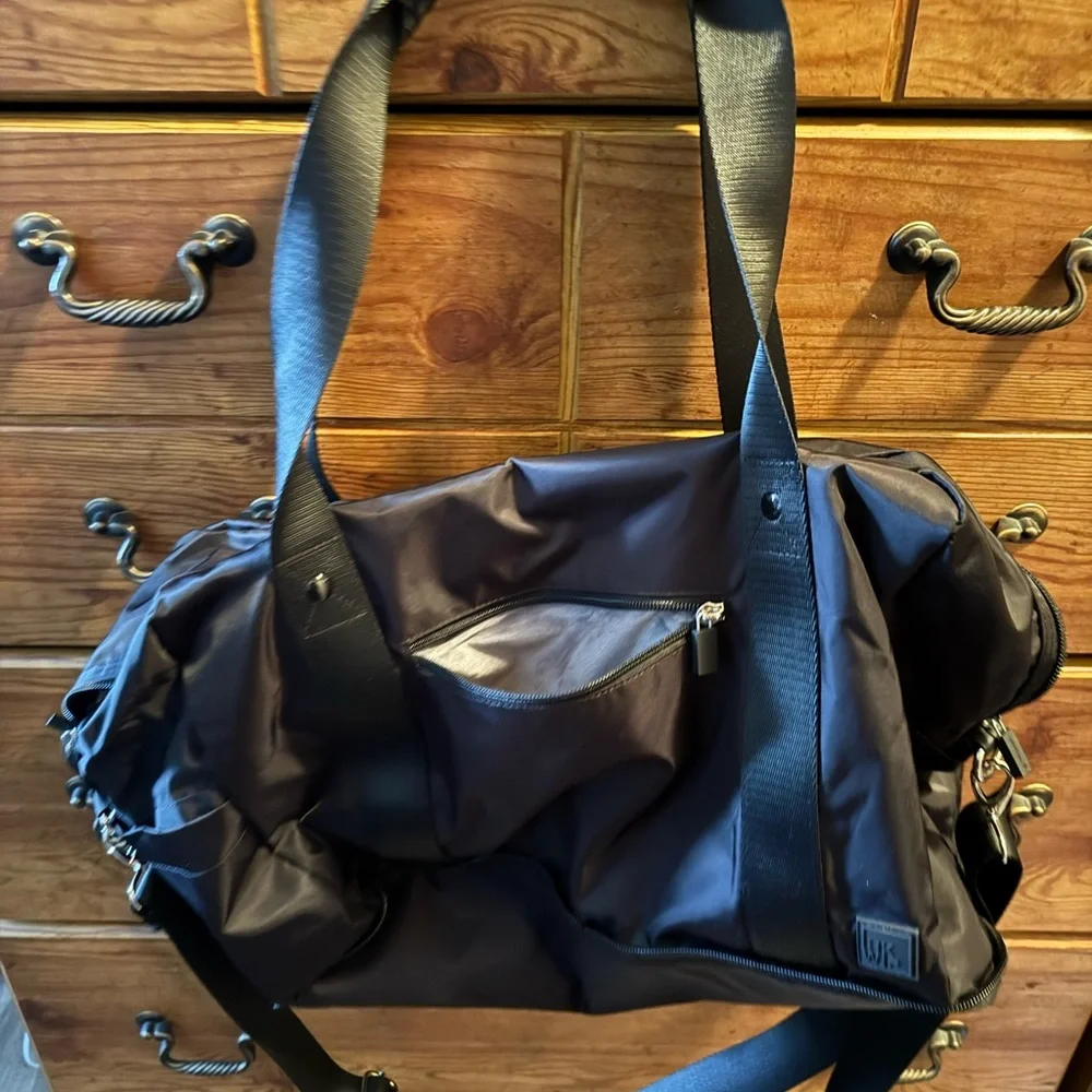IHKWIP brand black duffle bag with small cosmetic bag.   NWT - Picture 4 of 15